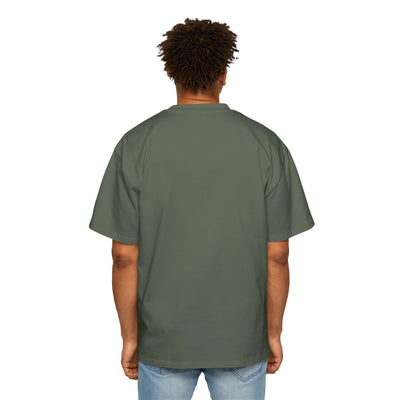 Person wearing a pine green t-shirt on a white background