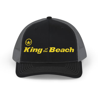 Black and gray cap with 'King of the Beach' text on a white background