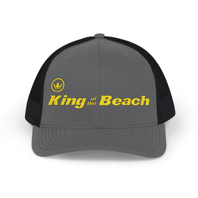 Gray and black cap with 'King of the Beach' text on a white background