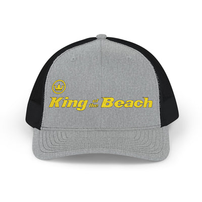 Gray and black cap with 'King of the Beach' text on a white background