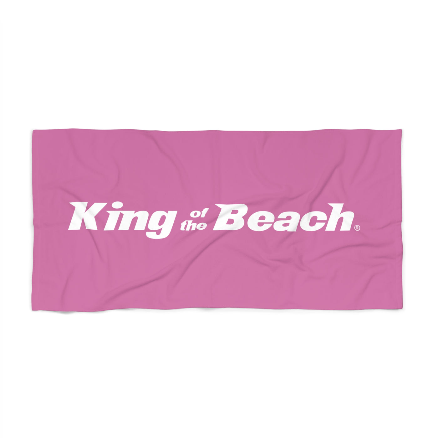 Pink towel with 'King of the Beach' logo 