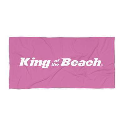 Pink towel with 'King of the Beach' logo 