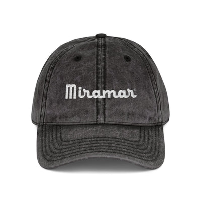 black cap with 'Miramar' logo on a white background