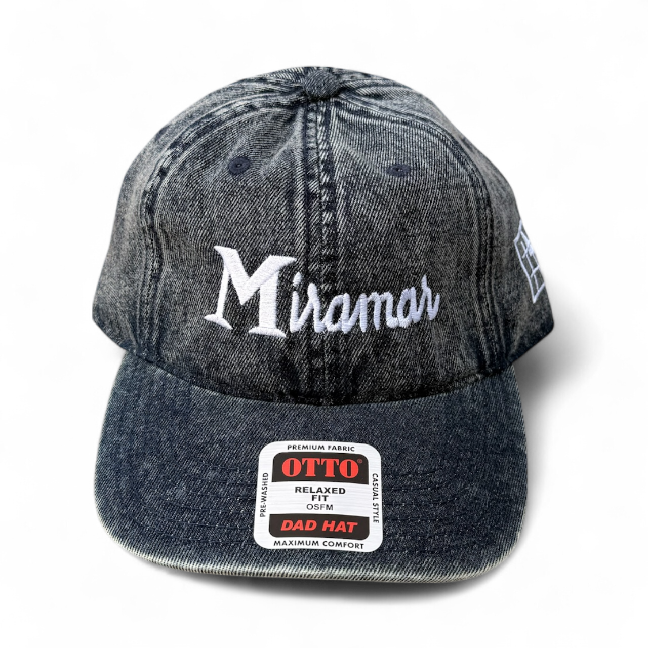 Denim cap with 'Miramar' branding on a white background
